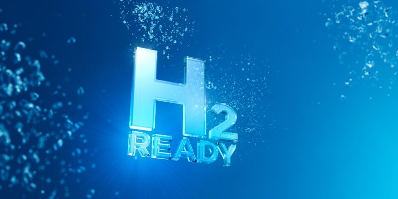 Schriftzug H2-ready auf blauem Grund, H2-ready-Heizungen sind eine Mogelpackung, denn Heizen mit Wasserstoff ist sehr teuer und wird nicht kommen.