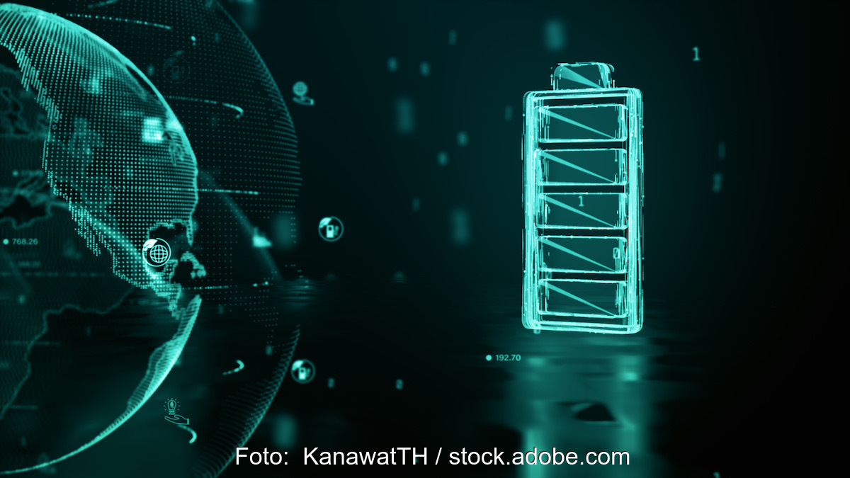 Ein Hologramm einer grün leuchtenden Batterie vor schwarzem Hintergrund
