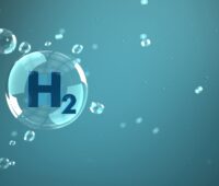 Synbol von Wasserstoff als Luftblase in blau-grünem Wasser