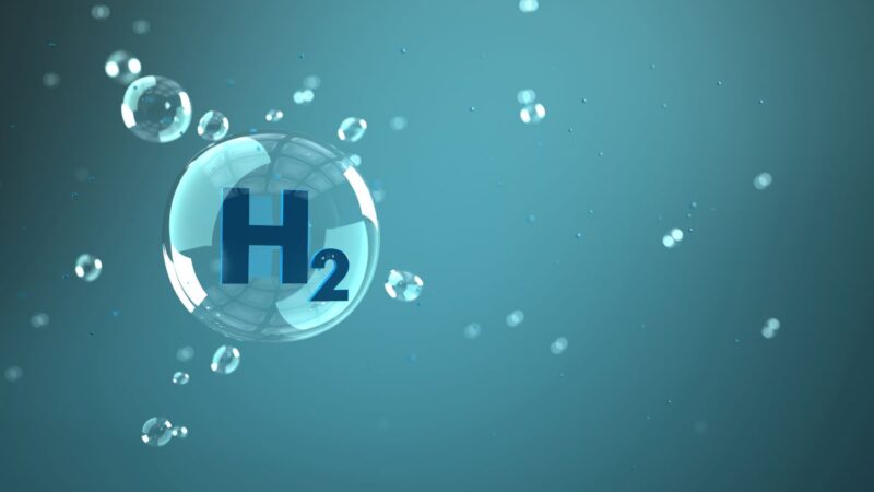Synbol von Wasserstoff als Luftblase in blau-grünem Wasser
