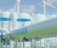 Eine Wasserstoffpipeline und Gastanks mit der blauen Aufschrift H2.