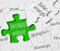 Ein Puzzle mit dem Teil “Energiewende”, die Expertenkommission sieht im Energiewende-Monitoring-Bericht 2025 in Deutschland Handlungsbedarf.
