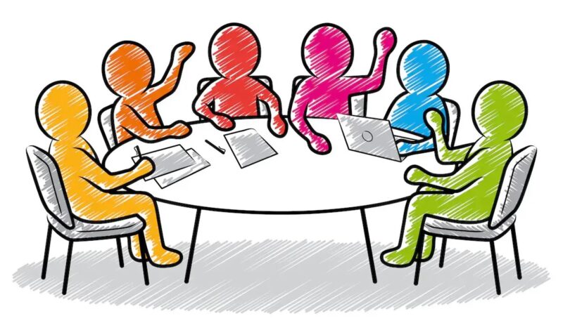 Strichmännchen an einem Tisch als Symbol den kommunalen Wärmeplan in Bremen.