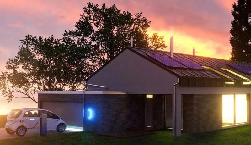 Ein Haus mit E-Auto, Netzbetreiber müssen eine Netzentgeltreduzierung für steuerbare Elektrofahrzeuge und Wärmepumpen anbieten.