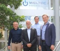 Zu sehen sind Verantwortliche von Weltec Biopower und Enscope, die Biogas in Australien voranbringen wollen.