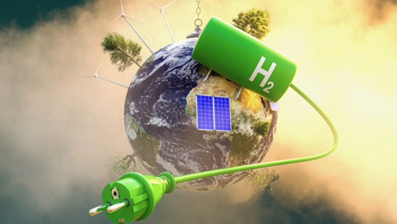 Im Bild eine Erdkugel mit wasserstofftank, Windenergie und Photovoltaik als Symbol für die Fortschreibung der Nationalen Wasserstoffstrategie.