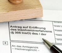 Im Bild ein Formular zur Eröffnung des Insolvenzverfahrens als Symbol für das Ende von Tubesolar.