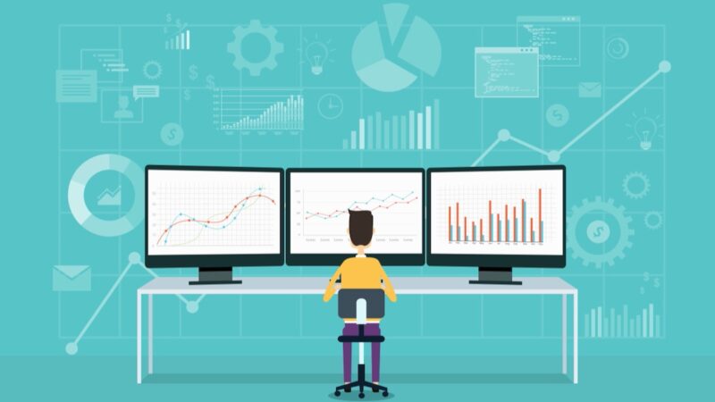 Grafik mit Mensch vor drei Monitoren, Symbol für Energiewende, Monitoring, Fortschritt