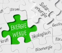 Ein Puzzle mit einem Teil mit der Aufschrift Energiewende als Symbol für die Energiewende im Koalitionsvertrag.