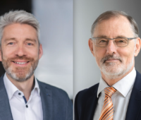 Portraitaufnahmen zweier Männer im Anzug - Christian Doetsch und Andreas Bett sind die neue Doppelspitze bei Fraunhofer.