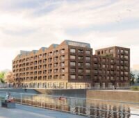 Rendering zeigt den Entwurf eines neuen Quartiers mit Gewerbeblöcken am Wasser sowie flanierenden Menschen.