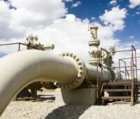 Eine Gaspipeline, Wirtschaftsministerin Katherina Reiche plant mit einer EnWG-Novelle die Einspeisung von Biomethan in Gasnetze schlechter zu stellen.