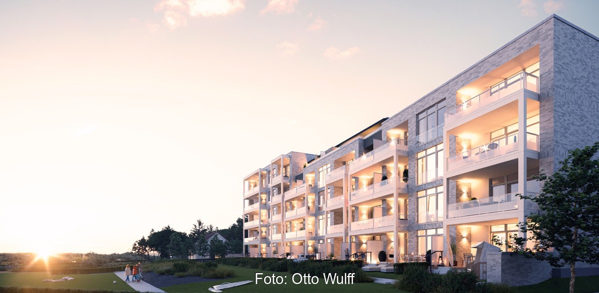 Animation eines strandnahen Neubaukomplexes bei Sonnenuntergang.