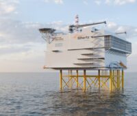Computergenerierte Darstellung einer Offshore-Konverterplattform auf dem Meer. Die Anlage steht auf einer Stahlunterkonstruktion in der Nordsee.