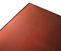 Ziegelrote Solarmodule der Solarfabrik für Photovoltaik-Anlagen auf denkmalgeschützten Gebäuden.