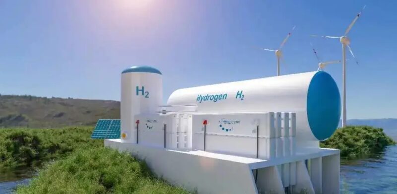 Photovoltaik, Windenergieanlagen und ein Wasserstofftank als Symbol für die Elektrolyse.