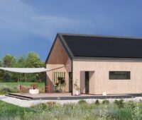 Im Bild eine Grafik eines modernen Holzhauses, dessen Dach mit dem N-Typ-TOPCon-Modul von Sharp belegt ist.