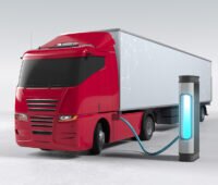 Grafische Darstellung eines E-LKW an einer Ladesäule