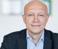 Portrait von Andreas Kuhlmann, Vorsitzender der Geschäftsführung der Deutschen Energie-Agentur (dena)